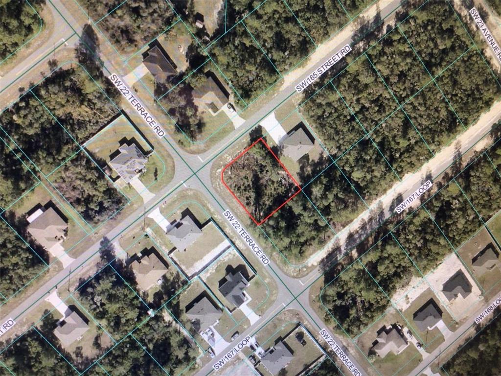 An aerial map view shows a vacant, wooded residential lot outlined in red — 0 SW 165 STREET ROAD, OCALA, FL