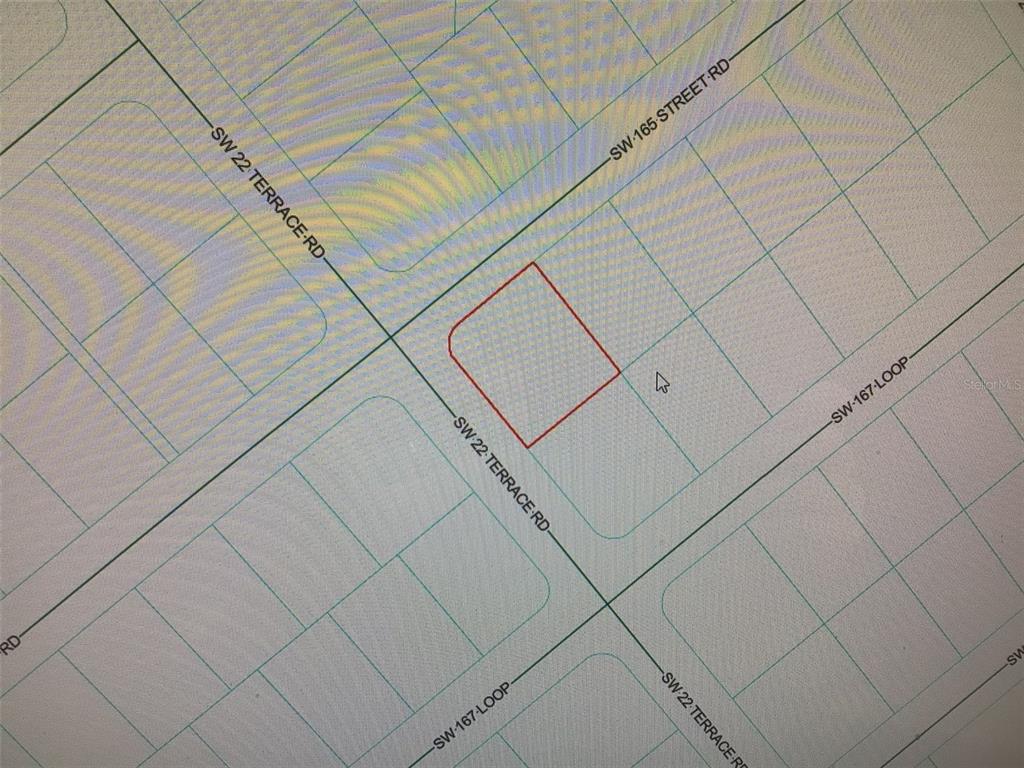This is a map showing a highlighted parcel of land at a street intersection — 0 SW 165 STREET ROAD, OCALA, FL