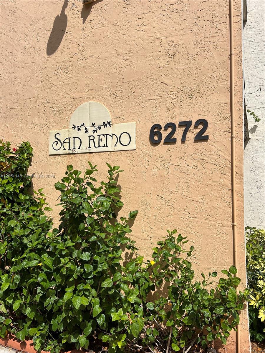 A beige stucco exterior wall features a San Remo sign and the number 6272 — 6272 NW 186th St # 104, Hialeah FL 33015, HIALEAH, FL