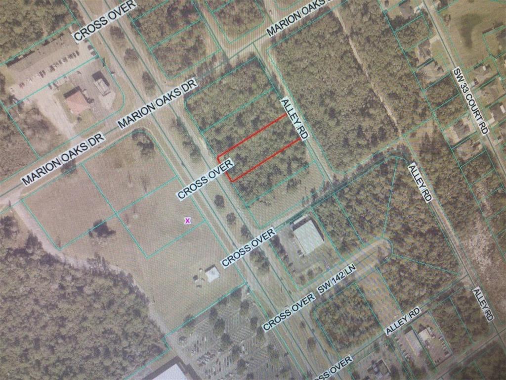 This is an aerial map showing a highlighted plot of land near various roads — 0 MARION OAKS BOULEVARD, OCALA, FL