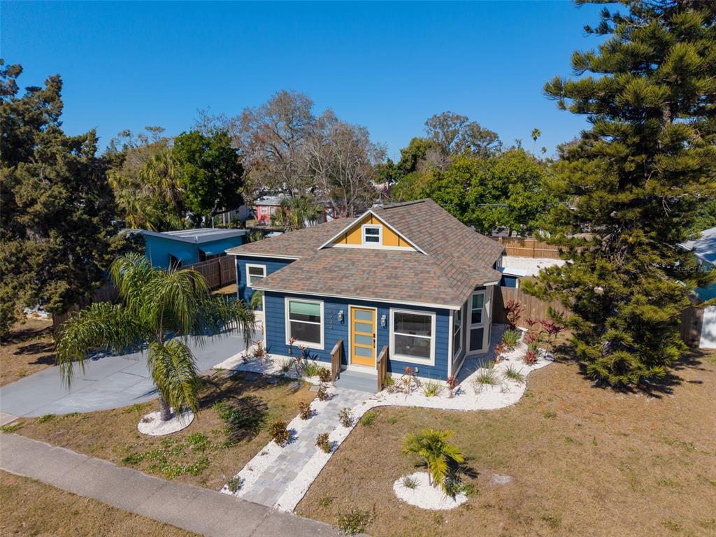 An aerial view of a blue house with a yellow door and a paved walkway — 4933 NEWTON AVENUE S, GULFPORT, FL