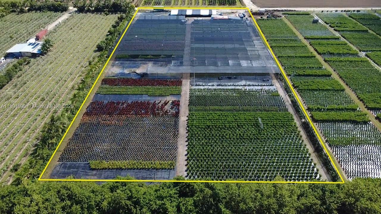 An aerial view shows a large commercial plant nursery with rows of potted plants and greenhouses — krome, Homestead FL 33034, HOMESTEAD, FL