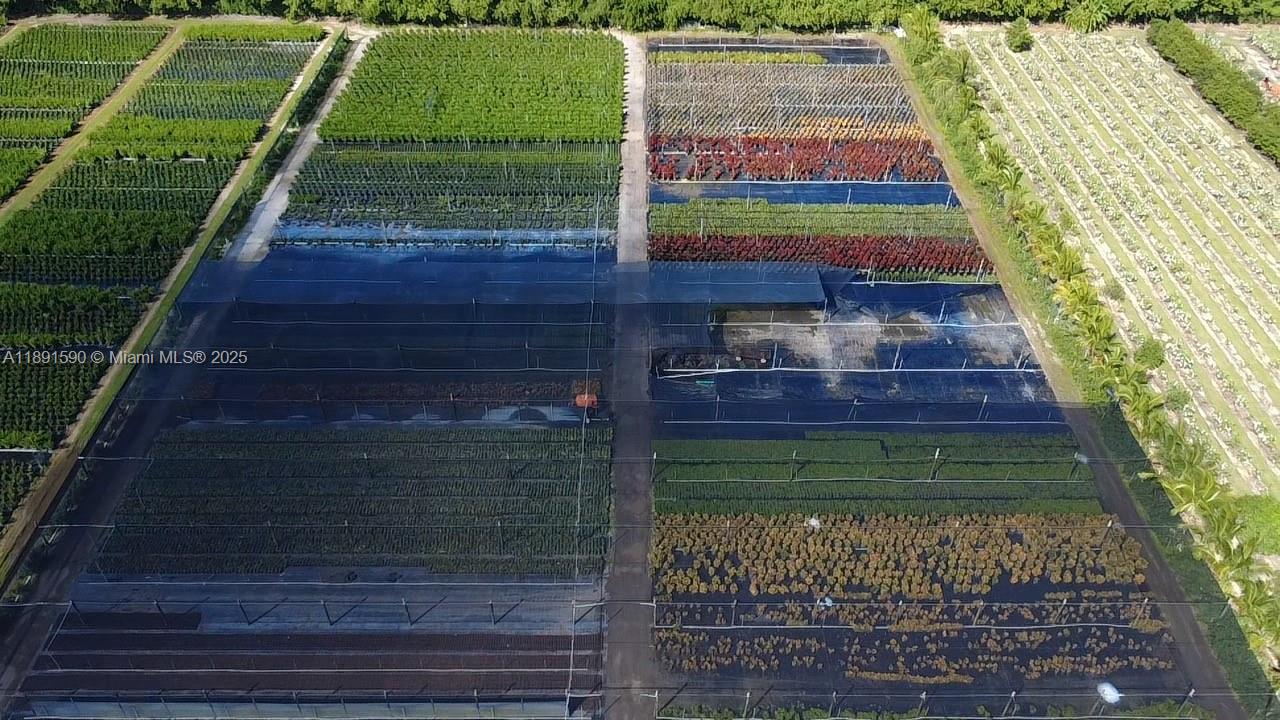 An aerial view shows a large commercial plant nursery with rows of various potted plants — krome, Homestead FL 33034, HOMESTEAD, FL