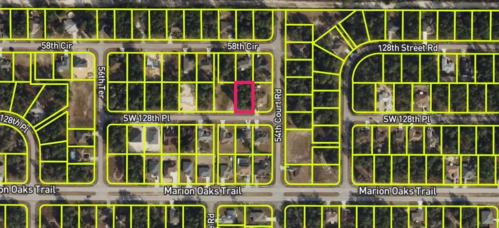 This is a satellite map showing a highlighted vacant residential lot in a suburban neighborhood — LOT 11 SW 128TH PLACE, OCALA, FL