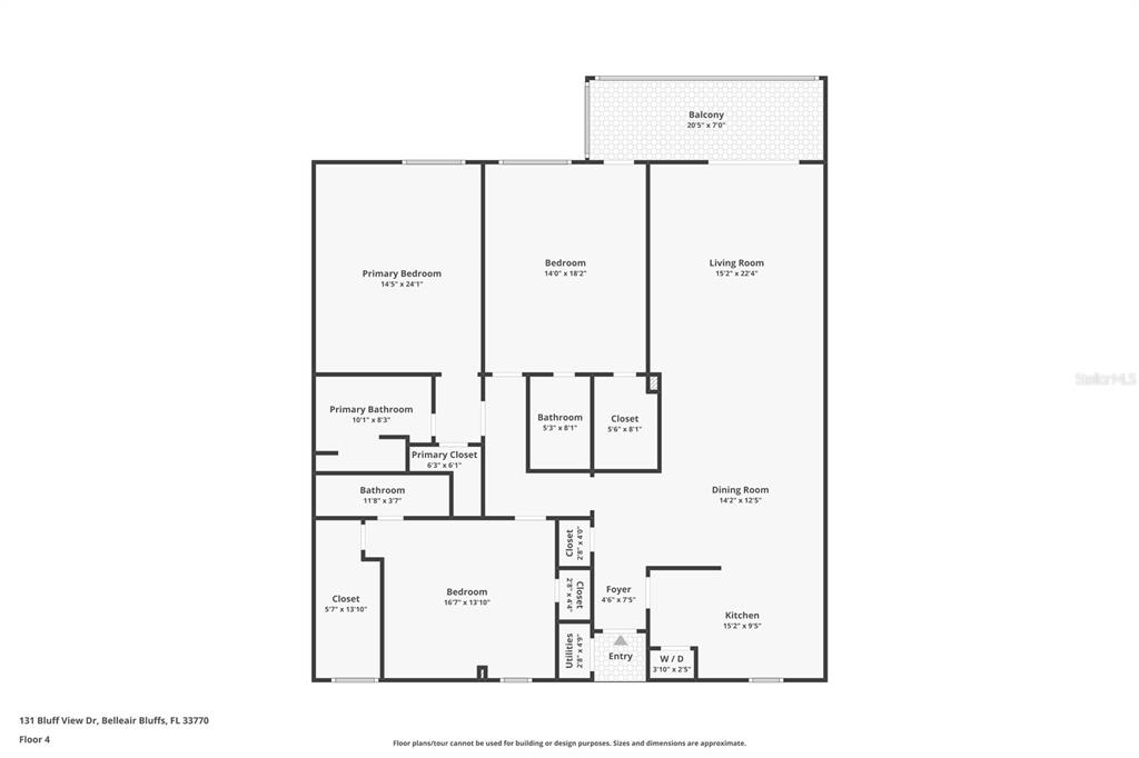 An open-concept living area features cork flooring, a kitchen with a breakfast bar, and striped walls — 131 BLUFF VIEW DRIVE UNIT 403, BELLEAIR BLUFFS, FL