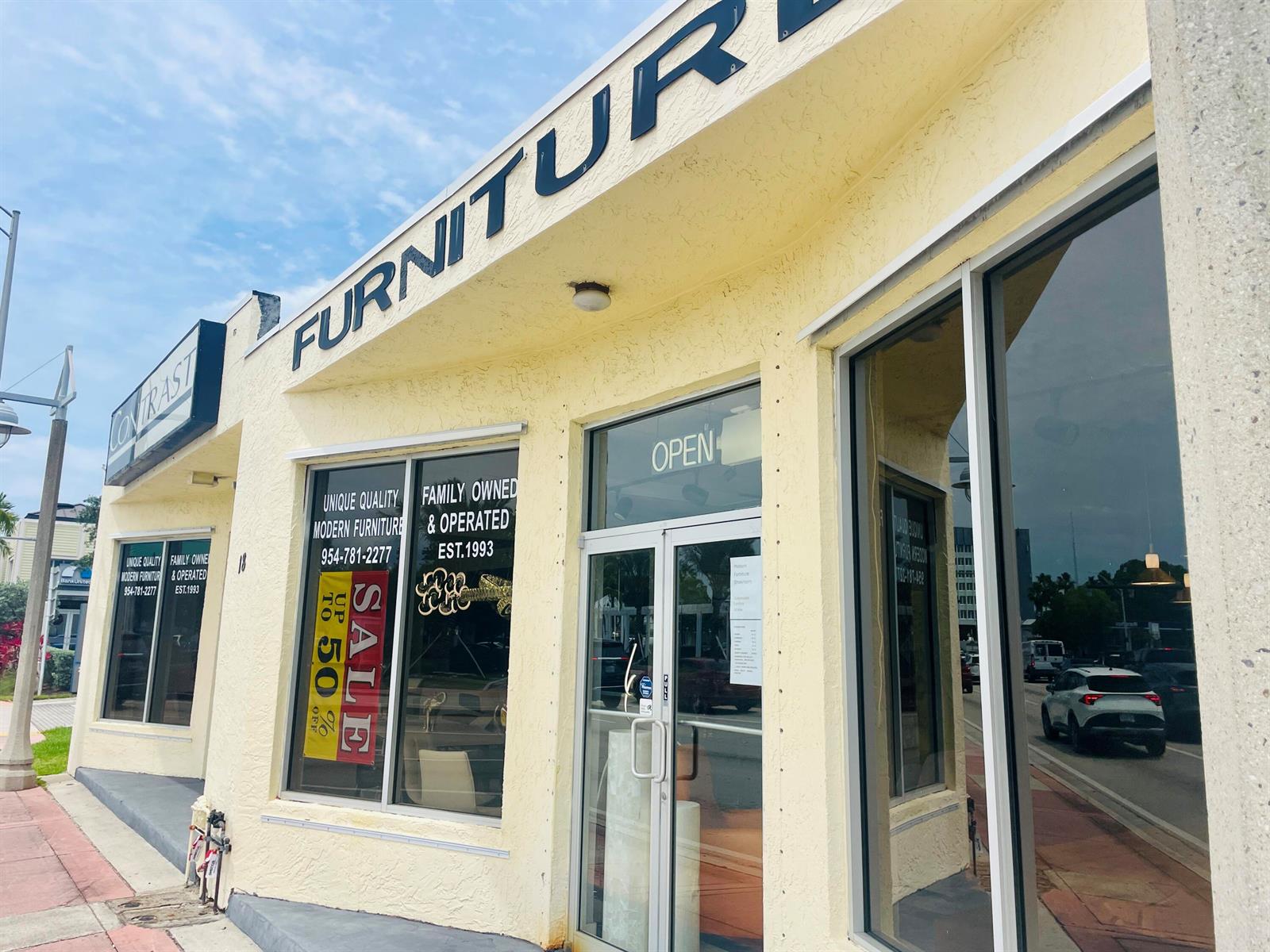 The exterior of a yellow commercial building features large glass windows and a sale sign — 18 S Federal Highway, Pompano Beach FL 33062, POMPANO BEACH, FL