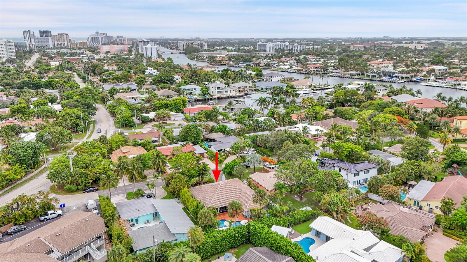 An aerial view shows a residential neighborhood with a red arrow pointing to a house — 3209 Norfolk Street, Pompano Beach FL 33062, POMPANO BEACH, FL