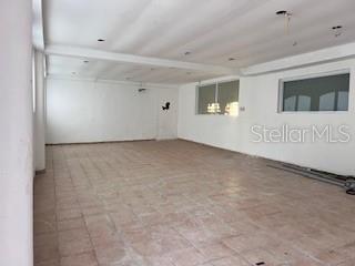 An empty room with white walls, a tiled floor, and recessed ceiling lighting — PR 1 Km 18.7 Int. SANCHEZ CAIMITO BAJO, SAN JUAN, PR