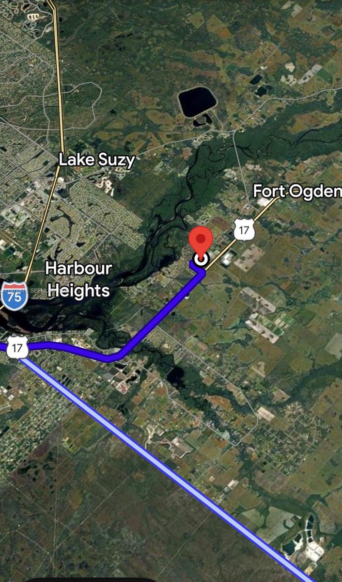 This map shows a satellite view of the area surrounding a property near Fort Ogden — 140 Vanilla Cir, Punta Gorda FL 33982, PUNTA GORDA, FL