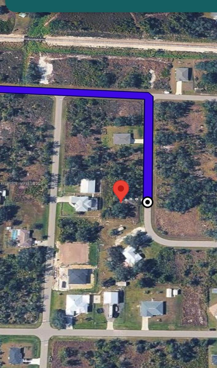 This is an aerial map view showing a vacant lot with a red location pin — 140 Vanilla Cir, Punta Gorda FL 33982, PUNTA GORDA, FL