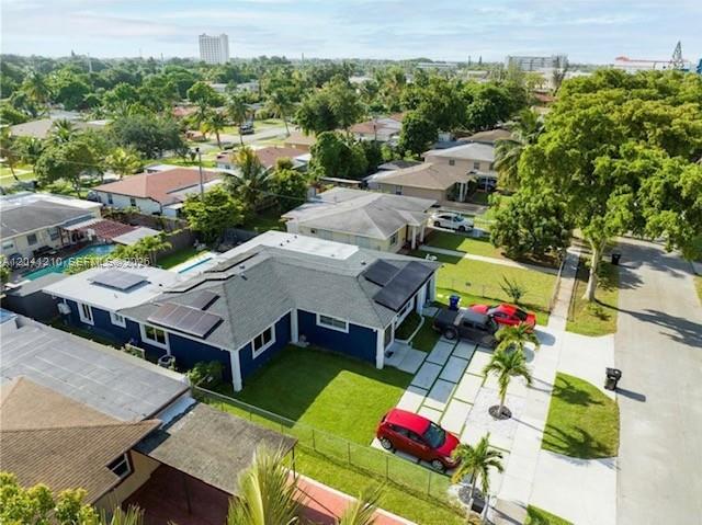 An aerial view shows a blue house with solar panels and a red car parked outside — 16100 NE 9th Ct, North Miami Beach FL 33162, NORTH MIAMI BEACH, FL
