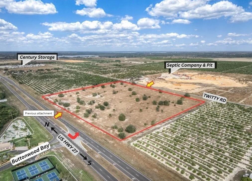 An aerial view shows a vacant, rectangular lot bordered by a highway and road — 9610 US-27 S, SEBRING, FL