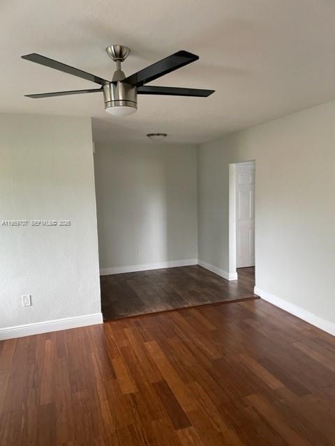An interior room features wood flooring, light-colored walls, and a modern ceiling fan — 2121 Biarritz Dr # 5, Miami Beach FL 33141, MIAMI BEACH, FL