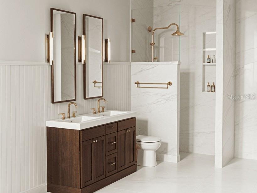 This bathroom features a double vanity with wood cabinets, gold fixtures, and a walk-in shower — 149 W WILBUR AVENUE UNIT 201, LAKE MARY, FL