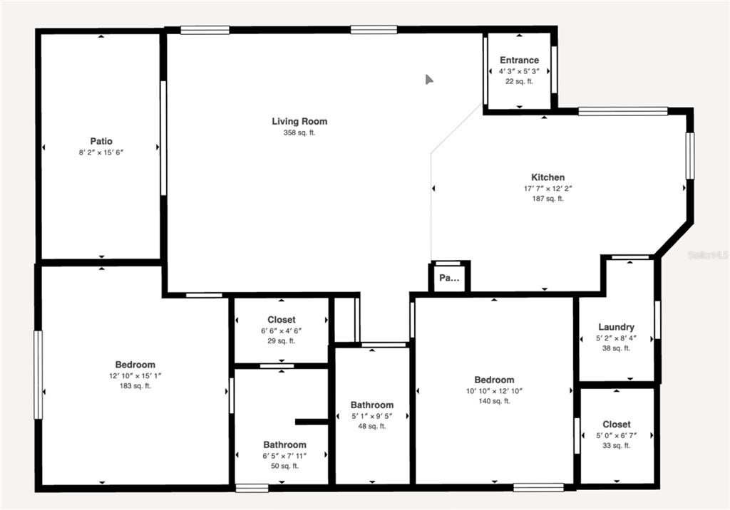 This is a floor plan showing a two-bedroom apartment with a patio and laundry room — 259 CENTER OAK CIRCLE, SPRING HILL, FL