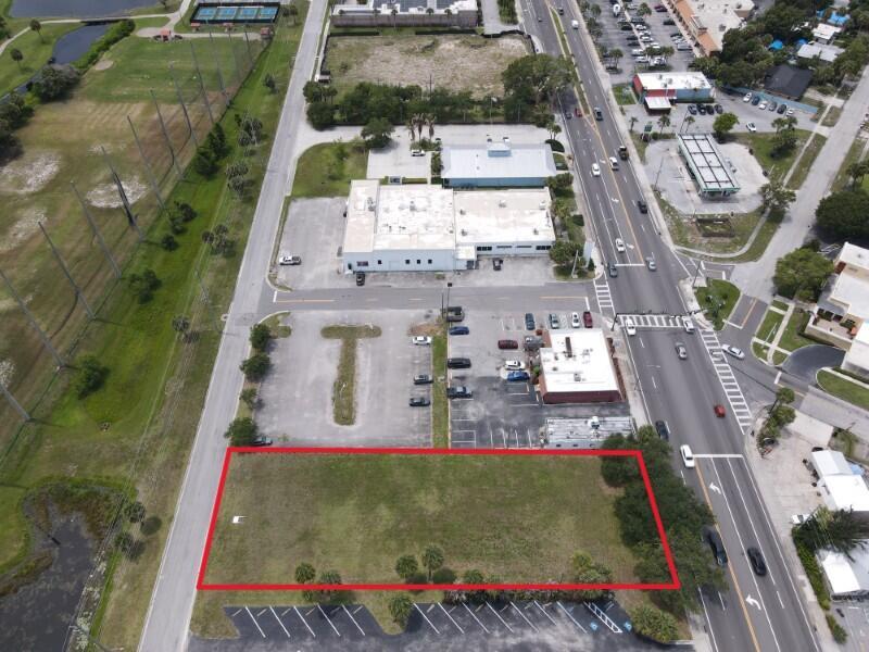 An aerial view shows a rectangular vacant lot outlined in red next to a road — 0 S 3rd Street, Fort Pierce FL 34950, FORT PIERCE, FL