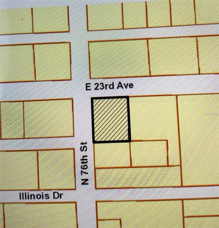 This is a map showing a highlighted rectangular property lot at a street intersection — 3009 N 76TH STREET, TAMPA, FL