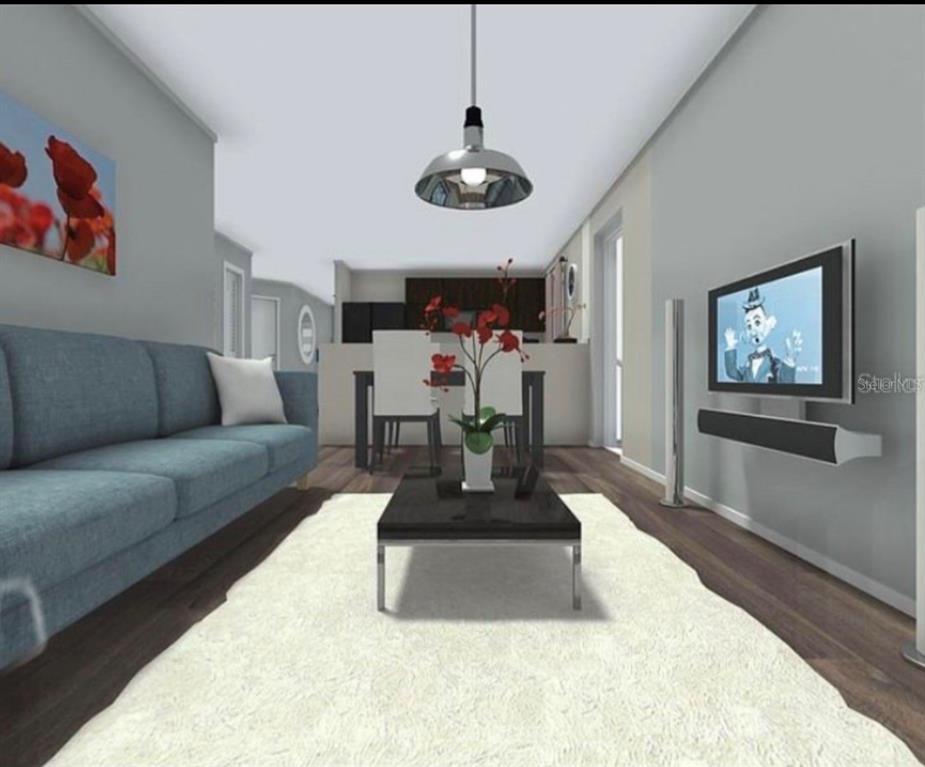 This is a digital rendering of a modern living room with a blue sofa — 1217 ECSTASY STREET E, LEHIGH ACRES, FL