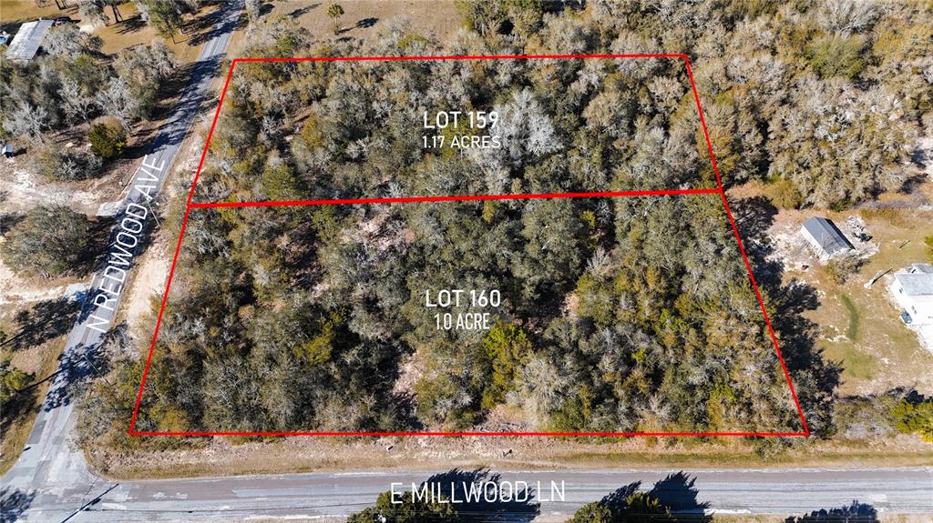 An aerial view shows two adjacent wooded lots outlined in red near a paved road — 4771 N REDWOOD AVENUE, HERNANDO, FL