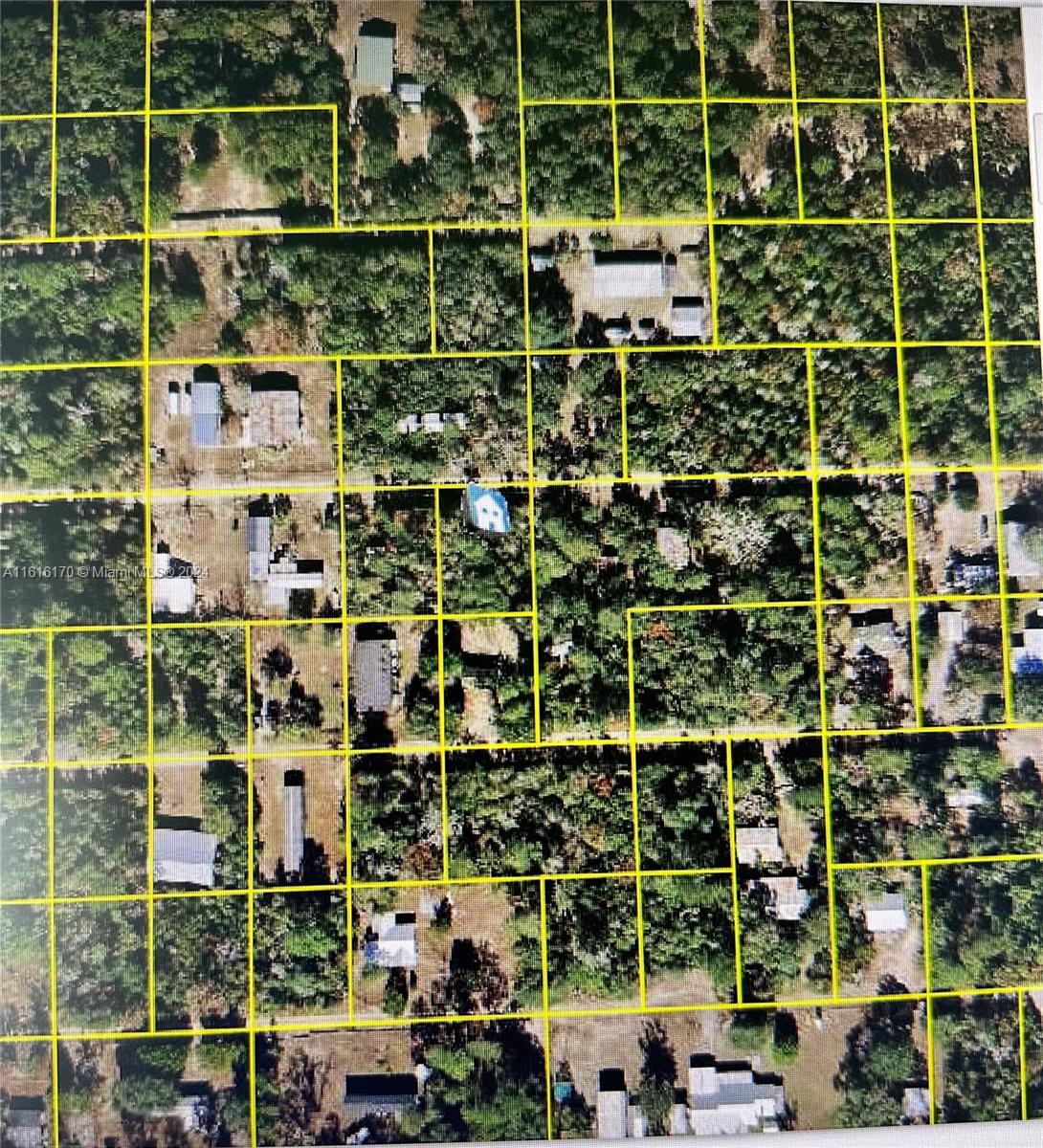 This is an aerial map showing multiple residential properties and land parcels outlined in yellow — 0 0, Ocala FL 32134, OCALA, FL
