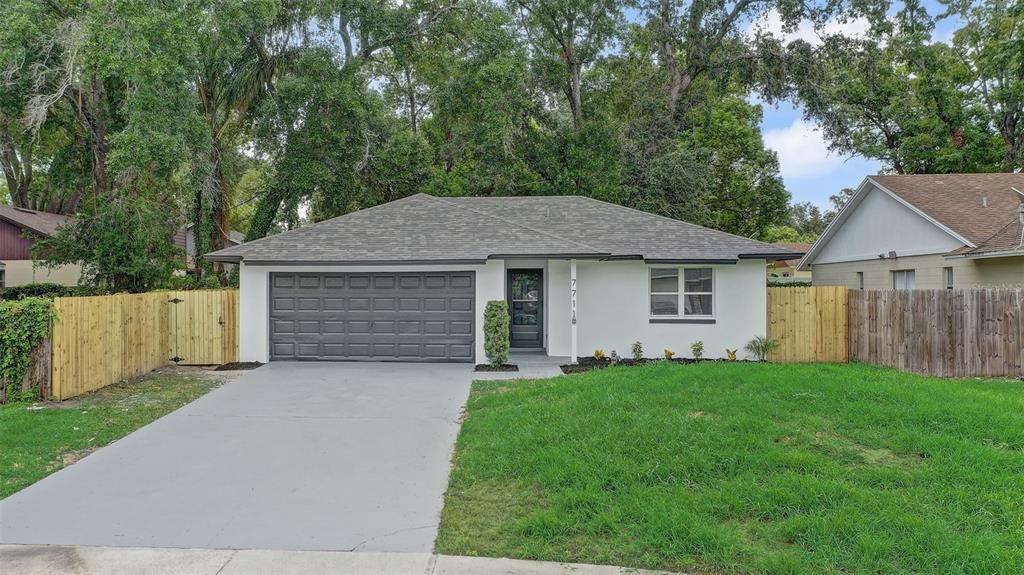 7711 LAKESIDE WOODS DRIVE