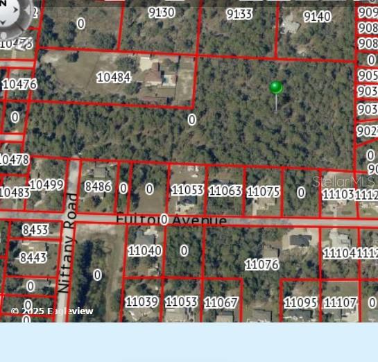 This is an aerial map showing property parcel boundaries and addresses along a residential street — 0 GANNET AVENUE, WEEKI WACHEE, FL