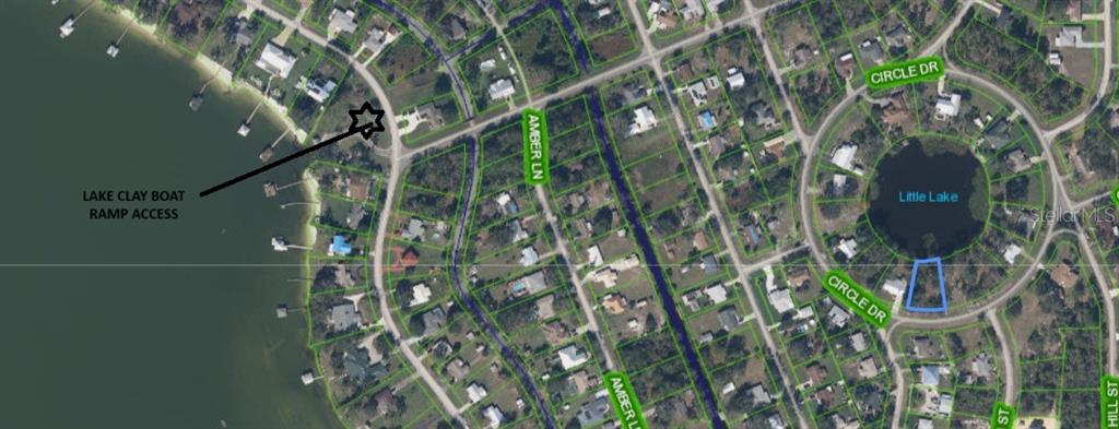 This aerial map shows a residential neighborhood with a highlighted lot and boat ramp access — 1719 CIRCLE DRIVE, LAKE PLACID, FL