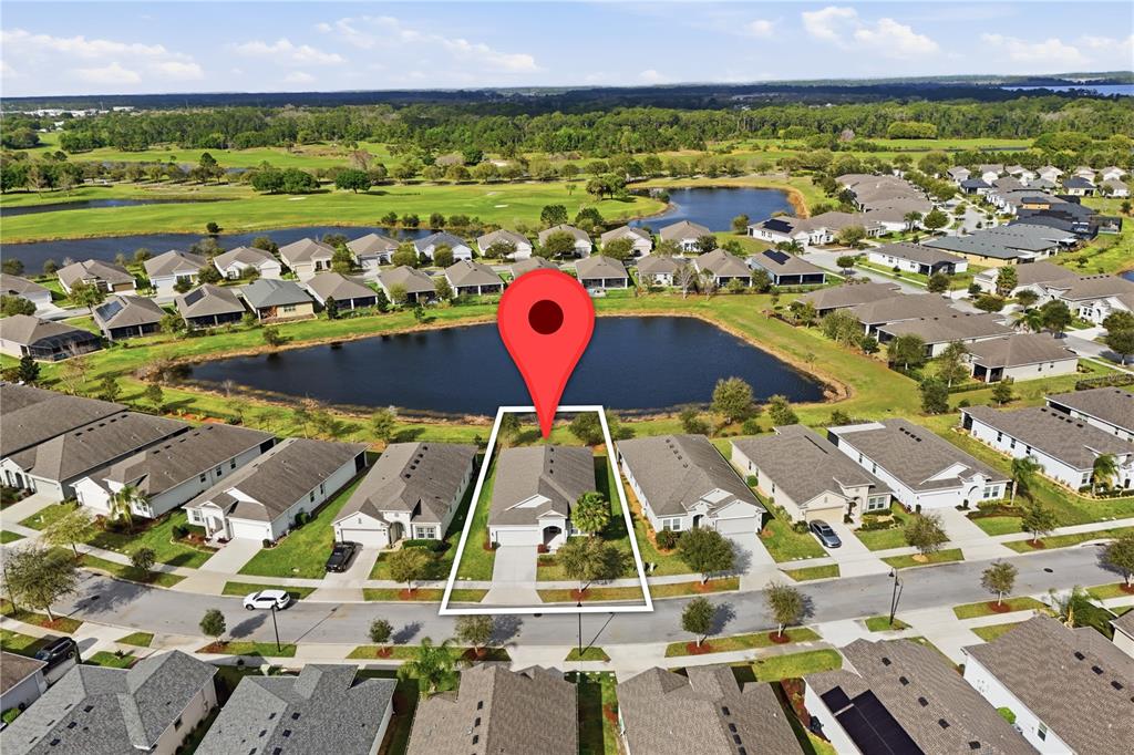 An aerial view shows a single-family house with a white outline and a location pin — 3383 SAGEBRUSH STREET, HARMONY, FL