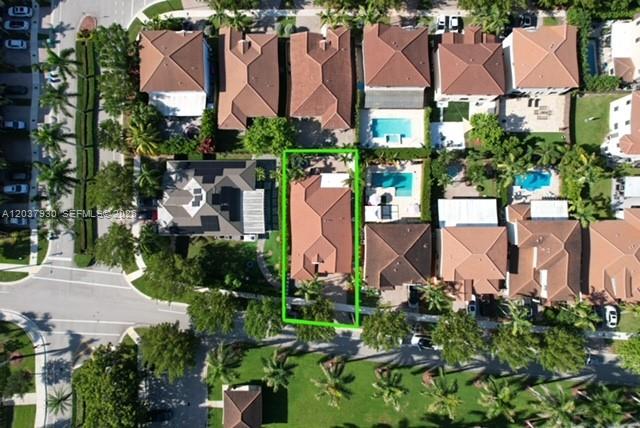 This aerial view shows a residential neighborhood with a highlighted house and swimming pool — 15404 SW 175th St, Miami FL 33187, MIAMI, FL