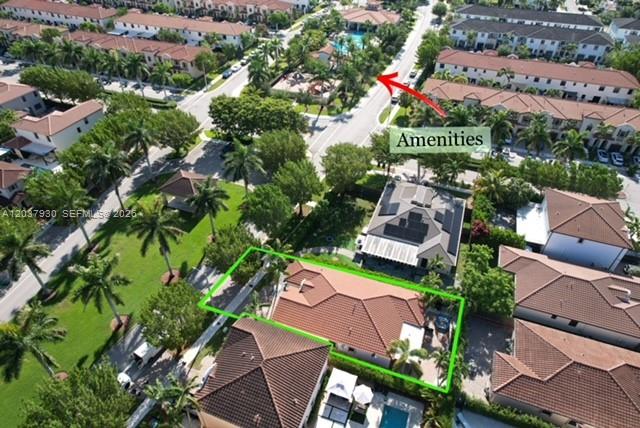 An aerial view shows a residential neighborhood with a highlighted house and nearby community amenities — 15404 SW 175th St, Miami FL 33187, MIAMI, FL