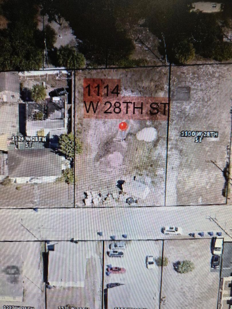 This aerial map shows a vacant rectangular lot situated between two existing residential properties — 1114 W 28th Street, Riviera Beach FL 33404, RIVIERA BEACH, FL