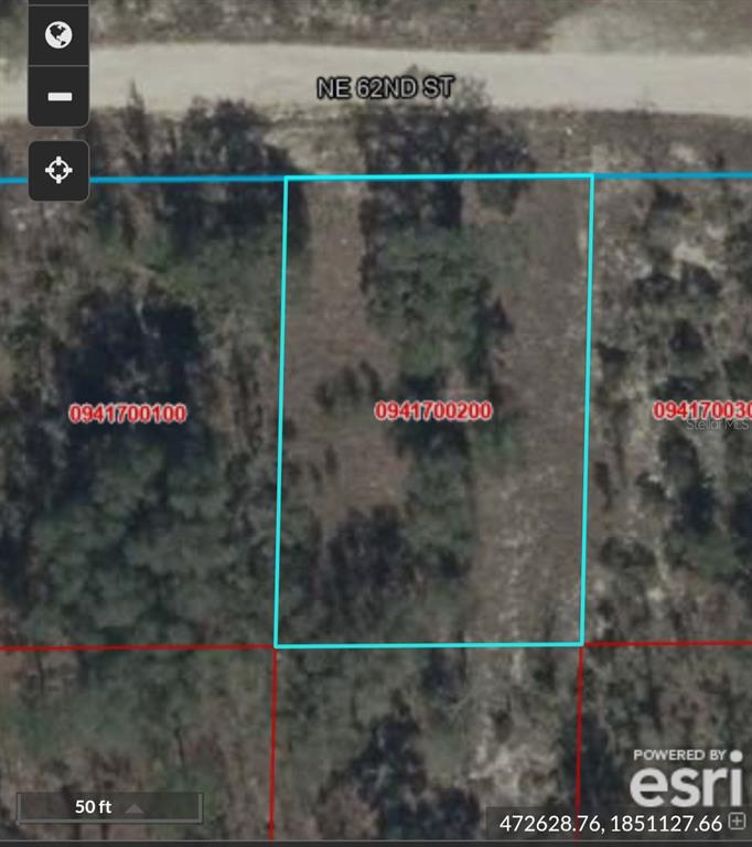 This is an aerial map view showing a rectangular plot of land labeled 0941700200 — 00 NE 62ND ST, WILLISTON, FL