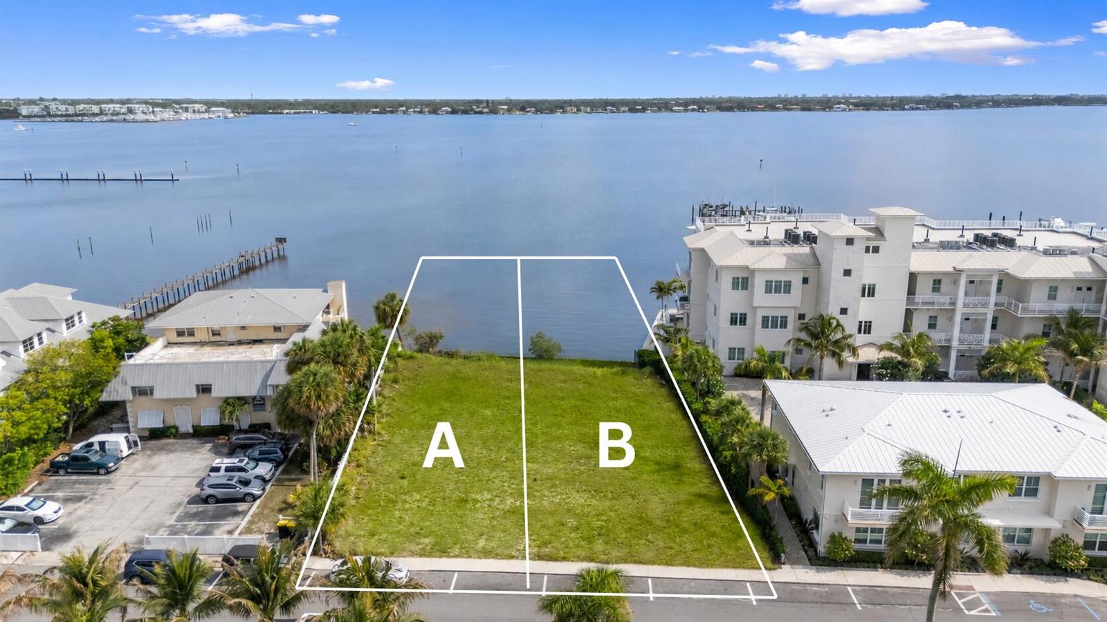 An aerial view shows two adjacent vacant waterfront lots labeled A and B — 39 SE Seminole Street, Stuart FL 34994, STUART, FL