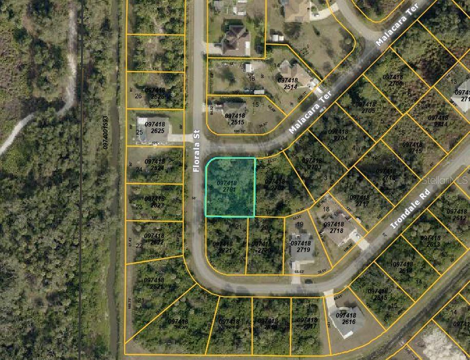 This is a property map showing a highlighted vacant lot surrounded by residential parcels — MALACARA TERRACE, NORTH PORT, FL