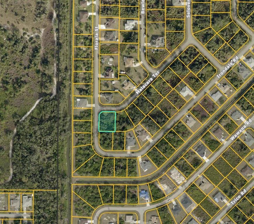 An aerial map view shows a highlighted vacant residential lot located on a curved street — MALACARA TERRACE, NORTH PORT, FL