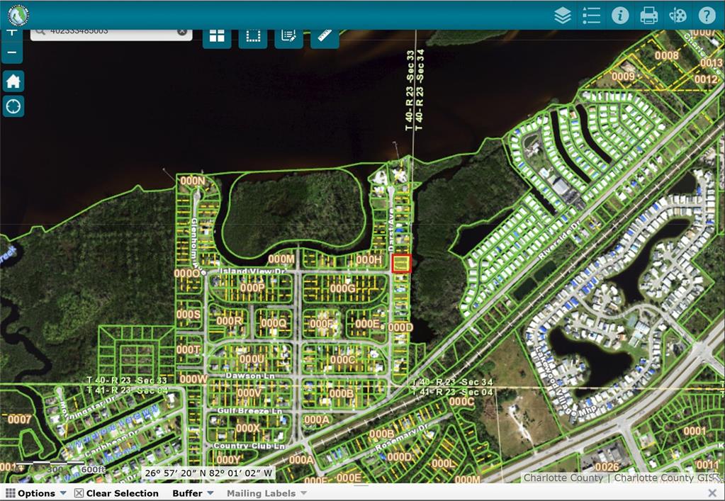 This is a GIS map showing residential lots, streets, and waterways in Charlotte County, Florida — 400 DARST AVENUE, PUNTA GORDA, FL