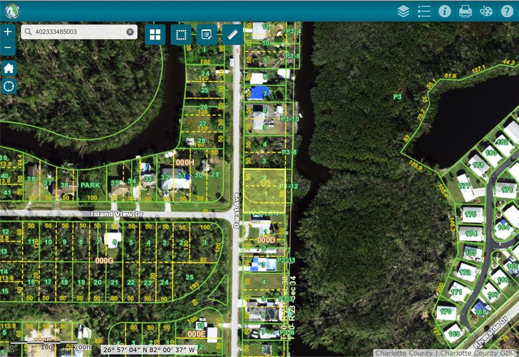 This is a digital map showing property parcel boundaries and street layouts in a residential area — 400 DARST AVENUE, PUNTA GORDA, FL