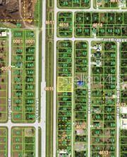 This is a satellite map view showing a residential lot highlighted in yellow — 10066 WINBOROUGH DRIVE, PORT CHARLOTTE, FL