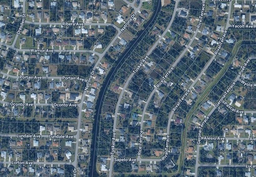 This is an aerial map view of a residential neighborhood with streets and houses — LOT 15 RICE TERRACE, NORTH PORT, FL