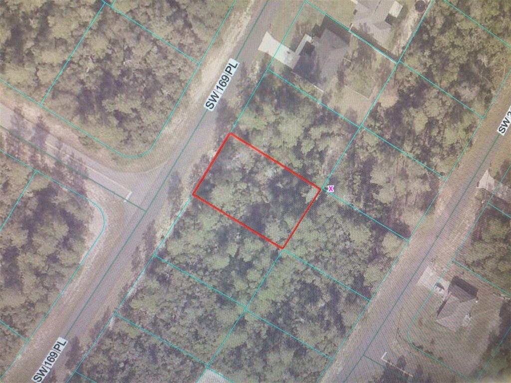 An aerial map shows a vacant, rectangular lot outlined in red between two residential streets — 0 SW 169 PLACE, OCALA, FL