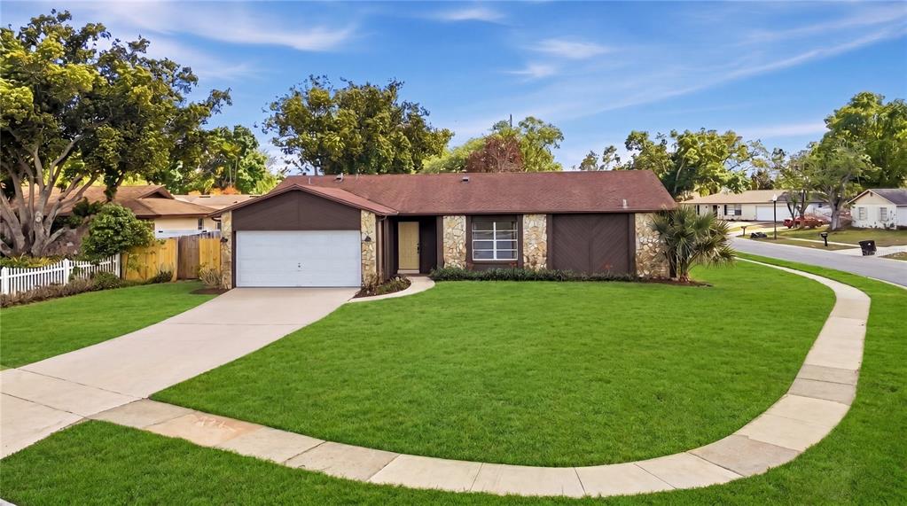 A swimming pool with a screened-in enclosure and a small shed in the backyard — 8040 TOWNE COURT, ORLANDO, FL