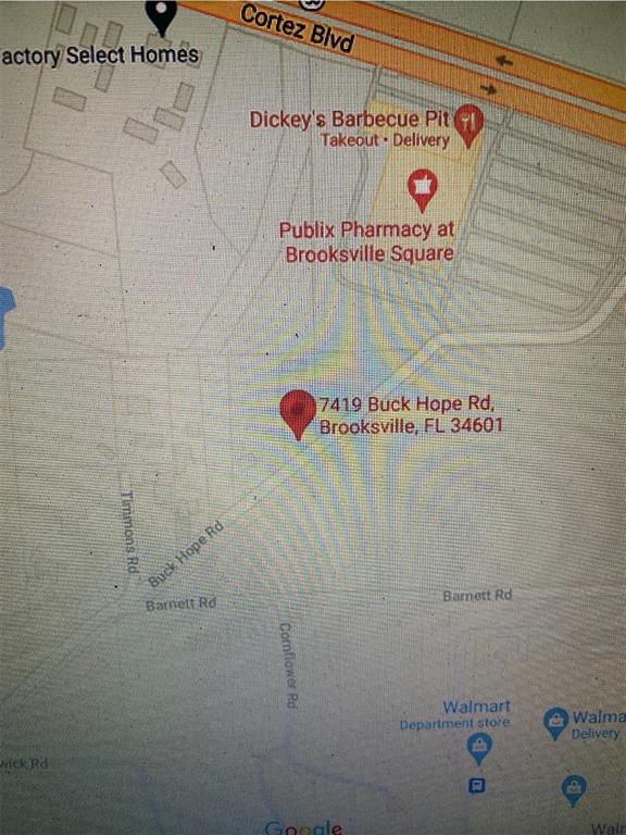This is a map showing the location of a property near local businesses and roads — 7419 BUCK HOPE ROAD, BROOKSVILLE, FL