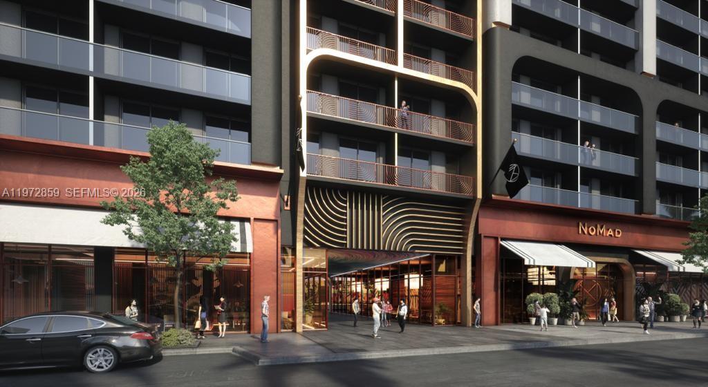 This architectural rendering shows the street-level entrance of a modern building with gold-toned accents — 2700 NW 2nd Ave # 814, Miami FL 33127, MIAMI, FL