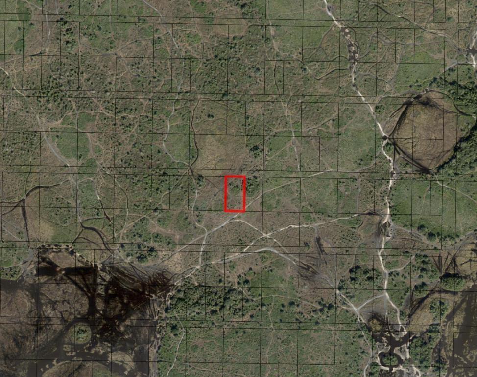 This is an aerial map showing a rectangular plot of land highlighted in red — 0 NW 310th Street, Okeechobee FL 34972, OKEECHOBEE, FL