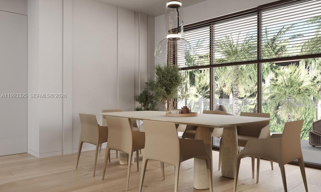This rendering shows a modern dining room with a light-colored table, chairs, and large windows — 1709 Jefferson Ave # 10, Miami Beach FL 33139, MIAMI BEACH, FL