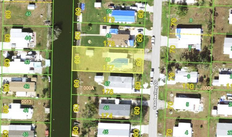 This is an aerial map view of a residential neighborhood with highlighted property boundaries — 1510 SANDERLING DRIVE, ENGLEWOOD, FL