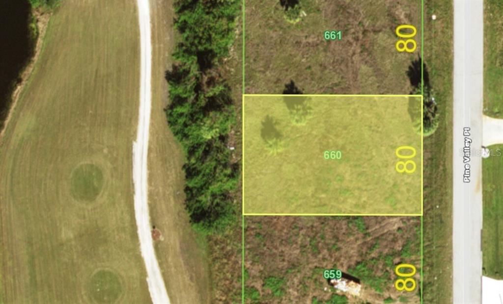 This is an aerial map showing a vacant rectangular lot highlighted in yellow — 30 PINE VALLEY PLACE, ROTONDA WEST, FL