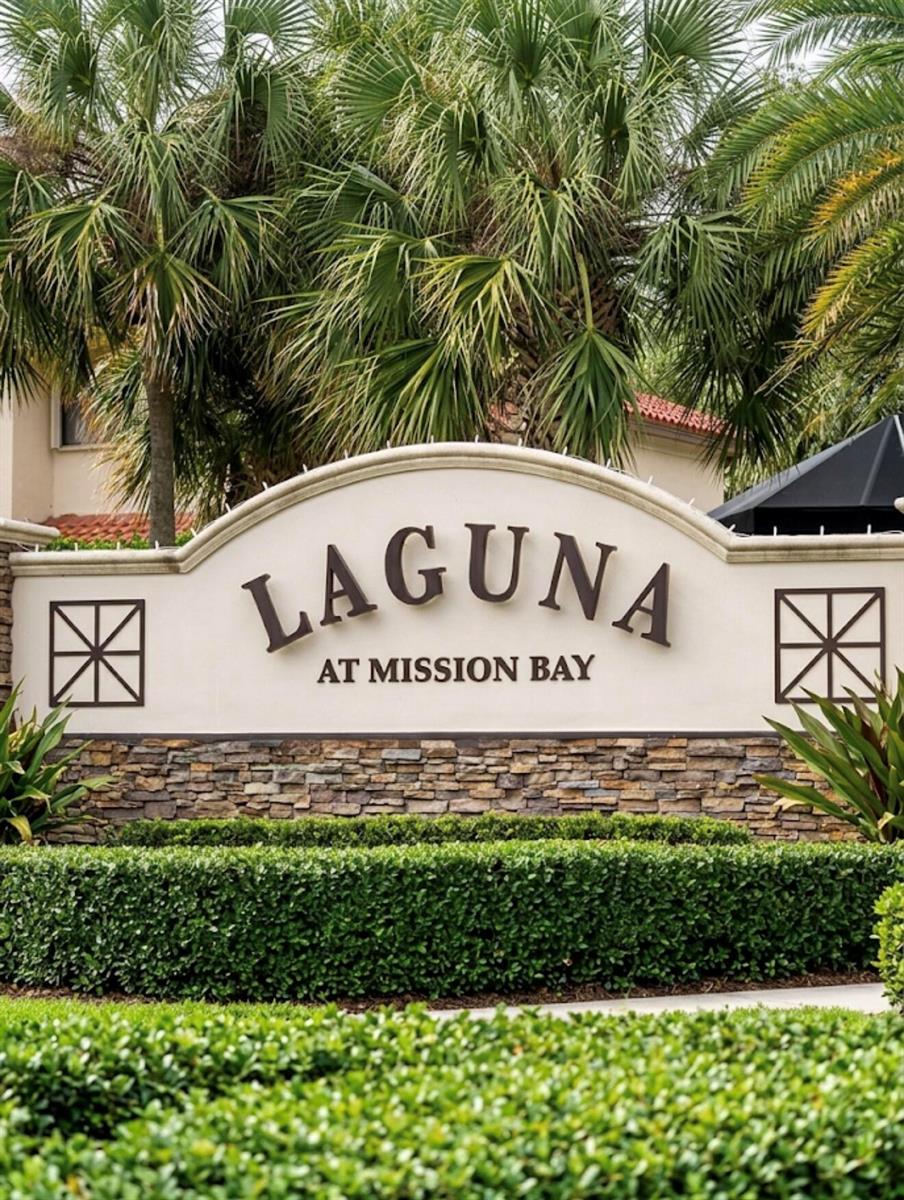 A stone and stucco monument sign reads Laguna at Mission Bay in front of palm trees — 10533 Mendocino Lane, Boca Raton FL 33428, BOCA RATON, FL