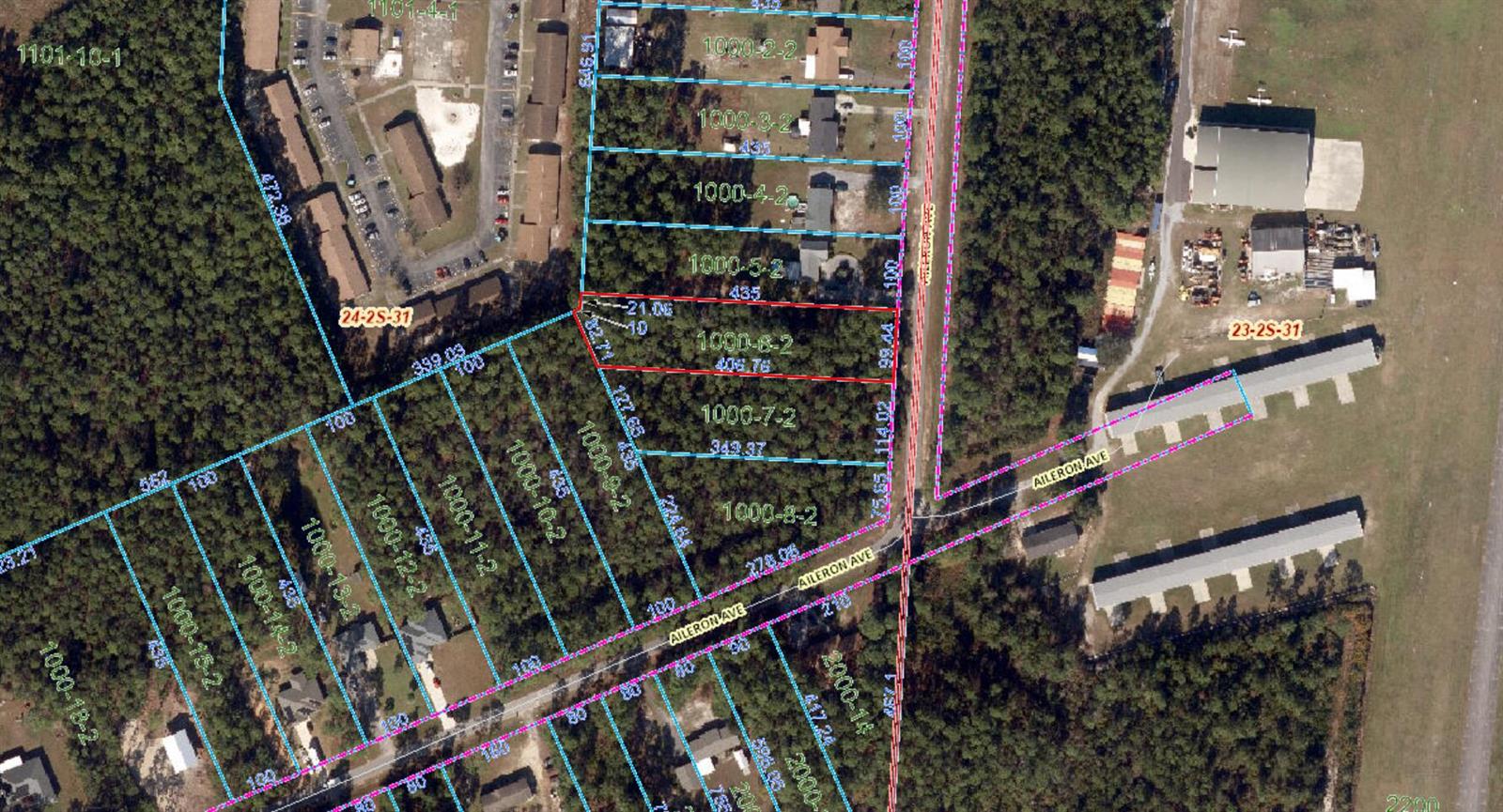 This is an aerial map showing property parcel boundaries and street layouts in a wooded area — 9897 Aileron Avenue, FL 32506, FL