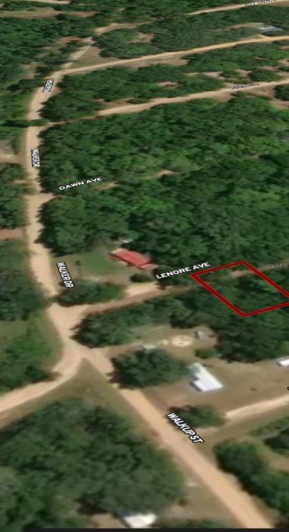 This is an aerial map view showing a vacant lot outlined in red near local streets — LOT 34 LENORE AVENUE, INTERLACHEN, FL